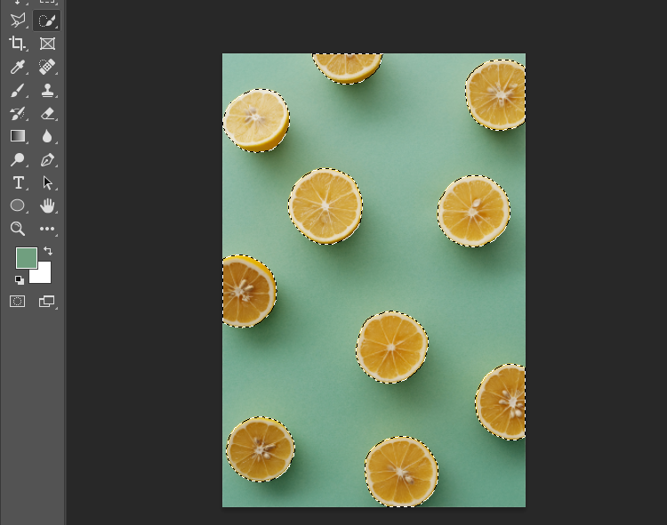 Oranges selected on the blueish-green background
